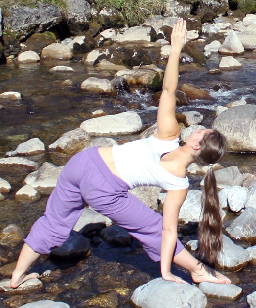 Try Extended Triangle Yoga Pose to Reduce Back Pain